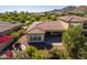Aerial view of a backyard with patio, seating area and bougainvillea at 3525 N Carlton St, Buckeye, AZ 85396