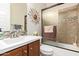 Clean bathroom with shower/tub combo and decorative wall art at 3525 N Carlton St, Buckeye, AZ 85396