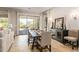 Bright dining area with sliding glass doors to backyard at 3525 N Carlton St, Buckeye, AZ 85396