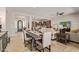 Open living room and dining area with a view of the kitchen at 3525 N Carlton St, Buckeye, AZ 85396