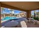 Inviting pool area with covered seating and BBQ at 3525 N Carlton St, Buckeye, AZ 85396