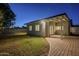 Spacious backyard with grassy area, paved patio, and block wall at 3743 W Dailey St, Phoenix, AZ 85053
