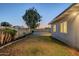 Large backyard with grassy lawn and a tree providing shade at 3743 W Dailey St, Phoenix, AZ 85053