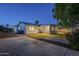 Large backyard with concrete patio and grassy area at 3743 W Dailey St, Phoenix, AZ 85053