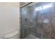 Updated bathroom with a walk-in shower and tile surround at 3743 W Dailey St, Phoenix, AZ 85053