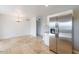Bright dining area with tile floors and chandelier at 3743 W Dailey St, Phoenix, AZ 85053