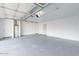 Spacious garage with light grey epoxy flooring at 3743 W Dailey St, Phoenix, AZ 85053