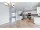Open concept kitchen with stainless steel appliances and tile floor at 3743 W Dailey St, Phoenix, AZ 85053