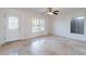 Living room featuring tile floors, a ceiling fan, and a view at 3743 W Dailey St, Phoenix, AZ 85053