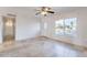 Bright living room with tile floors and a view of the front yard at 3743 W Dailey St, Phoenix, AZ 85053