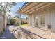 Covered patio with brick pavers and french doors at 3743 W Dailey St, Phoenix, AZ 85053