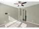 Light and airy bedroom with neutral walls and carpet flooring at 731 E Verde Blvd, Queen Creek, AZ 85140
