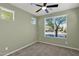 Bright bedroom with carpet flooring and large window at 731 E Verde Blvd, Queen Creek, AZ 85140