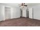 Primary bedroom with two closets and carpet flooring at 8106 N 31St Dr, Phoenix, AZ 85051