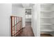 Spacious hallway with built-in shelving and a ceiling fan at 8106 N 31St Dr, Phoenix, AZ 85051