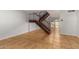 Living room with tiled floors and an open staircase at 8106 N 31St Dr, Phoenix, AZ 85051