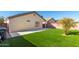 Artificial turf and backyard patio at 12417 W Via Camille --, El Mirage, AZ 85335