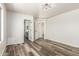 Spacious bedroom with wood-look flooring and ample natural light at 12417 W Via Camille --, El Mirage, AZ 85335