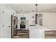 Updated kitchen featuring stainless steel appliances and an island at 12417 W Via Camille --, El Mirage, AZ 85335