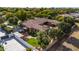 Aerial view of a luxurious home with pool and lush landscaping at 2912 E Vaughn Ave, Gilbert, AZ 85234