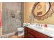 Bathroom with walk-in shower, toilet, and vanity at 2912 E Vaughn Ave, Gilbert, AZ 85234