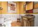 Upscale bathroom with ornate vanity and decorative mirror at 2912 E Vaughn Ave, Gilbert, AZ 85234