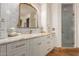 Bathroom with a vanity and walk-in shower at 2912 E Vaughn Ave, Gilbert, AZ 85234