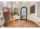 Grand entryway with high ceilings, tile flooring and decorative accents at 2912 E Vaughn Ave, Gilbert, AZ 85234