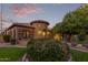 Stunning Spanish-style home with beautifully landscaped front yard at 2912 E Vaughn Ave, Gilbert, AZ 85234