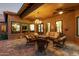 Relaxing outdoor patio with wicker furniture and fire pit at 2912 E Vaughn Ave, Gilbert, AZ 85234