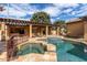 Resort-style pool with spa and ample deck space at 2912 E Vaughn Ave, Gilbert, AZ 85234
