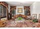 Charming sitting room with a comfortable couch and large windows at 2912 E Vaughn Ave, Gilbert, AZ 85234