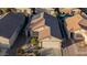 Aerial view of a single-story house with tile roof and driveway at 664 W Jardin Dr, Casa Grande, AZ 85122