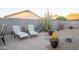 Desert landscape with patio furniture, water feature, and cacti at 664 W Jardin Dr, Casa Grande, AZ 85122