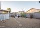 Spacious backyard with gravel, plants, and patio furniture at 664 W Jardin Dr, Casa Grande, AZ 85122