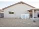 Backyard with gravel, plants, and patio area at 664 W Jardin Dr, Casa Grande, AZ 85122