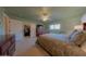 Bright bedroom with double bed, dresser, and walk-in closet at 664 W Jardin Dr, Casa Grande, AZ 85122