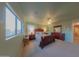 Bright Primary bedroom with ample natural light and a ceiling fan at 664 W Jardin Dr, Casa Grande, AZ 85122