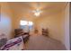 Cozy bedroom with a large window and comfortable seating at 664 W Jardin Dr, Casa Grande, AZ 85122