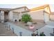 Landscaped front yard with stone pathway, and drought-tolerant plants at 664 W Jardin Dr, Casa Grande, AZ 85122
