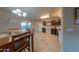 Kitchen with dark wood cabinets, granite countertops, and tiled floor at 664 W Jardin Dr, Casa Grande, AZ 85122