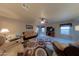 Spacious living room with tiled floors and comfortable furniture at 664 W Jardin Dr, Casa Grande, AZ 85122