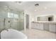 Spa-like bathroom with soaking tub, large shower, and double vanity at 9382 E Aster Dr, Scottsdale, AZ 85260
