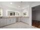 Elegant bathroom with double vanity, large mirror, and updated fixtures at 9382 E Aster Dr, Scottsdale, AZ 85260