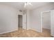 Well-lit bedroom featuring a ceiling fan and ample closet space at 9382 E Aster Dr, Scottsdale, AZ 85260