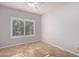 Charming bedroom with plantation shutters and tile flooring at 9382 E Aster Dr, Scottsdale, AZ 85260