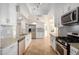 Bright kitchen boasts granite countertops and stainless steel appliances at 9382 E Aster Dr, Scottsdale, AZ 85260