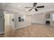Modern kitchen with granite countertops and white cabinets at 9382 E Aster Dr, Scottsdale, AZ 85260