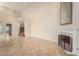 Spacious living room featuring a fireplace and high ceilings at 9382 E Aster Dr, Scottsdale, AZ 85260