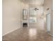 High-ceiling living room with fireplace and tile floors at 9382 E Aster Dr, Scottsdale, AZ 85260